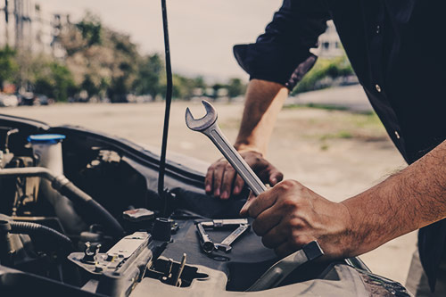 Mechanic checking over an engine - Car Repairs Glenrothes, Fife