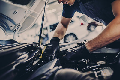 Mechanic checking the engine - Car Servicing Glenrothes, Fife